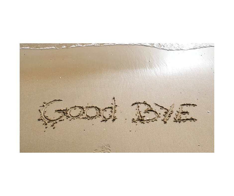 words 'good bye' written in the sand